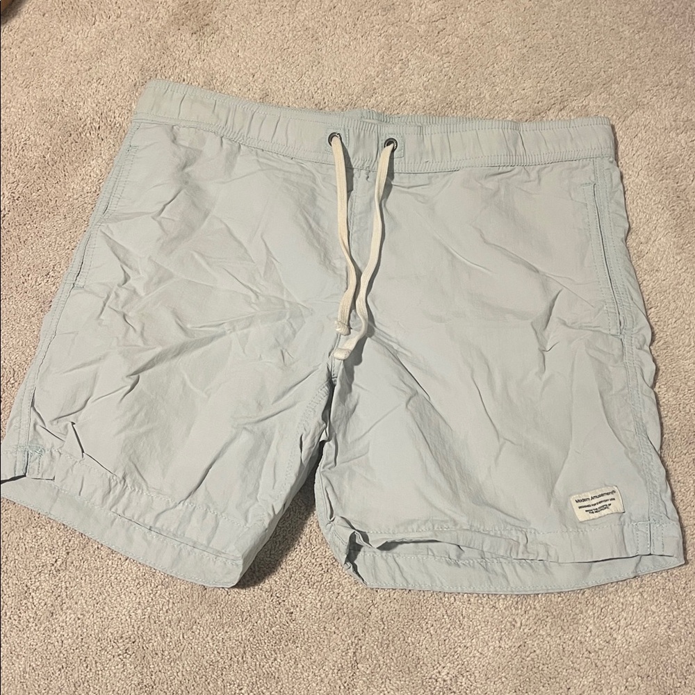 Modern Amusement size small light blue bathing suit